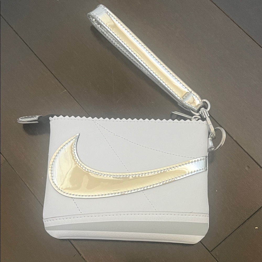 Nike White Wristlet with Metallic Gold Swoosh and Strap